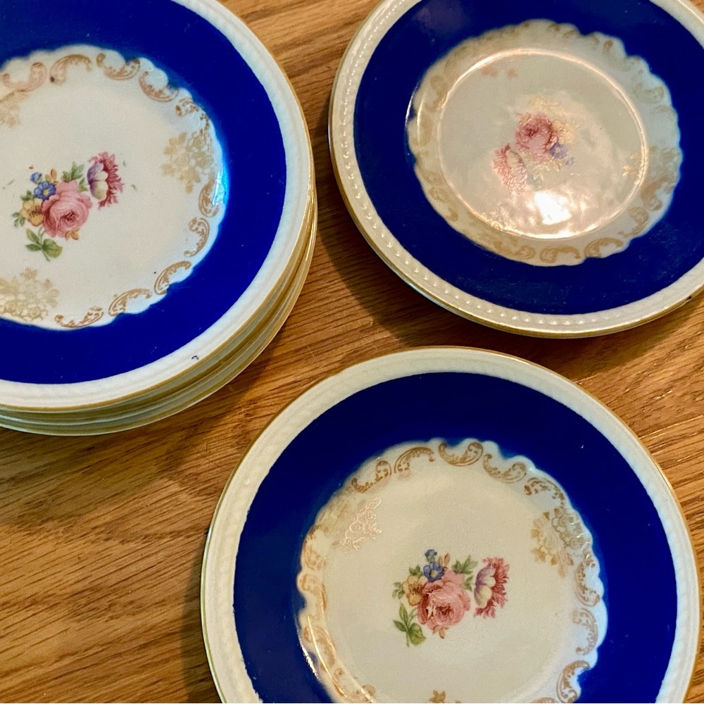 Six Bavarian rose china plates.
